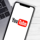 The YouTube logo on a phone
